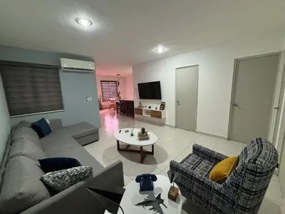 Una televisión o centro de entretenimiento en Departamento en privada en Mazatlan, con alberca