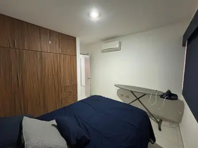Cama o camas de una habitación en Departamento en privada en Mazatlan, con alberca