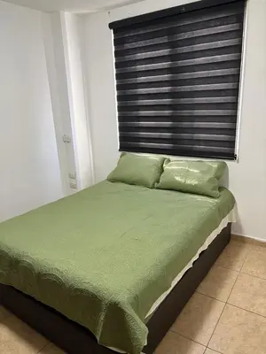 Cama o camas de una habitación en Departamento Torres del Rio Privada Desarrollo Urbano Tres Rios Facturamos