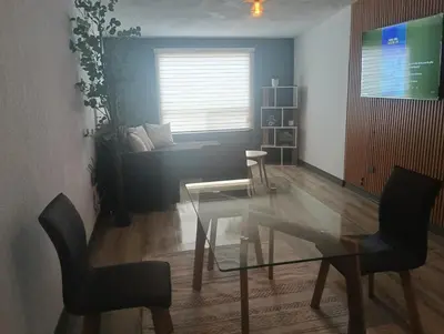 Una televisión o centro de entretenimiento en - Casa cómoda - 5 min del complejo Ind Chihuahua