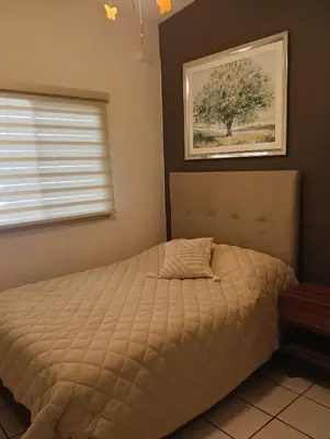 Cama o camas de una habitación en - Casa cómoda - 5 min del complejo Ind Chihuahua