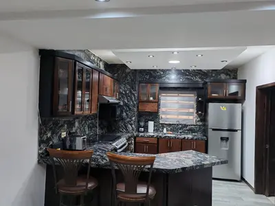 Una cocina o zona de cocina en Comfortable house 15 min Consulate 10 min Bridge