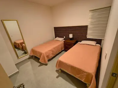 Cama o camas de una habitación en 102 Un Modern Living