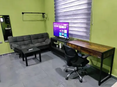 Una televisión o centro de entretenimiento en Saltillo Lofts en excelente ubicación
