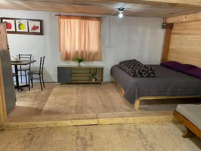 Cama o camas de una habitación en Cabañas El Ensueño