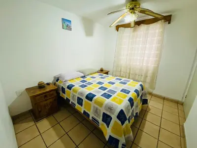 Cama o camas de una habitación en SmartStay House Spacious, equipped and comfortable