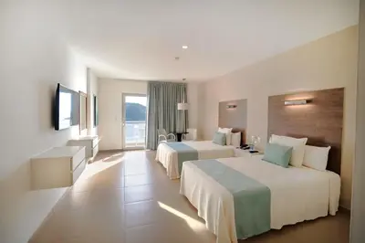 Cama o camas de una habitación en Pacific Palace Beach Tower Hotel