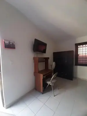 Una televisión o centro de entretenimiento en Nice apartment in the north