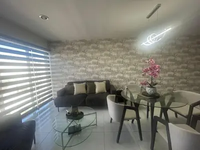Zona de estar de Depa Palmeras Adora Mazatlán