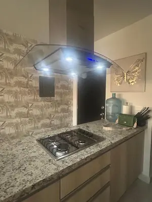Una cocina o zona de cocina en Depa Palmeras Adora Mazatlán
