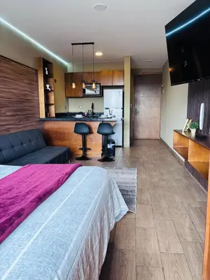 Una cocina o zona de cocina en Loft moderno y acogedor