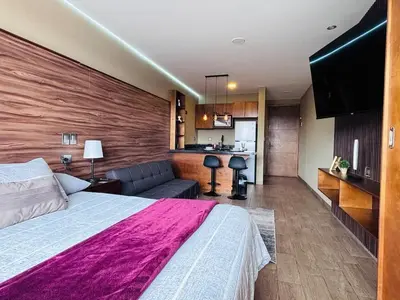 Una cocina o zona de cocina en Loft moderno y acogedor