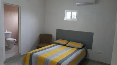 Cama o camas de una habitación en Spacious house near the beach