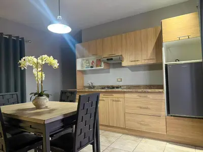 Una cocina o zona de cocina en Nueva Vizcaya & Suites