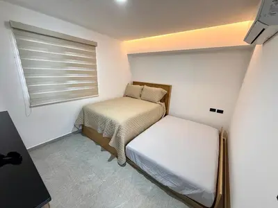 Cama o camas de una habitación en Nautilus Marina Mazatlan 216 Alberca