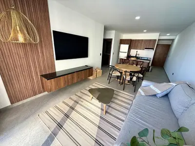 Una televisión o centro de entretenimiento en Nautilus Marina Mazatlan 303 Alberca