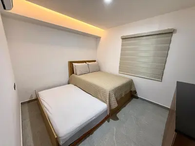 Cama o camas de una habitación en Nautilus Marina Mazatlan 303 Alberca
