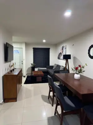Una televisión o centro de entretenimiento en Casa en Privada con Alberca!