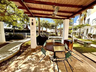 Zona de estar de Almar Departamento con alberca cerca de la playa