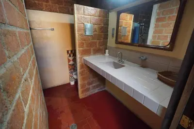 Un baño de Habitacion Faro