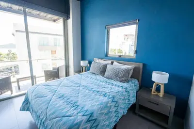 Cama o camas de una habitación en Manzara 153 hermoso departamento