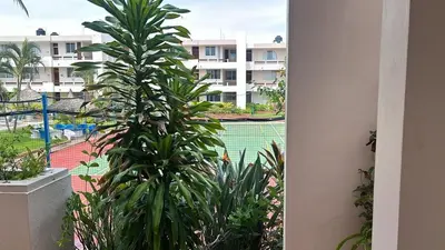 Jardín al aire libre en Exclusive Oceanfront Apartment on the Beach