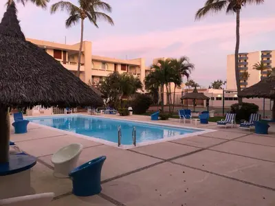 Piscina en o cerca de Exclusive Oceanfront Apartment on the Beach