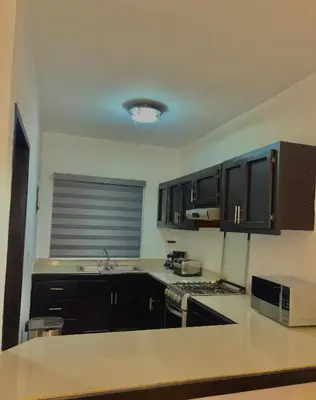 Una cocina o zona de cocina en departamento