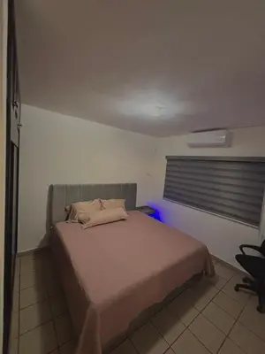 Cama o camas de una habitación en departamento