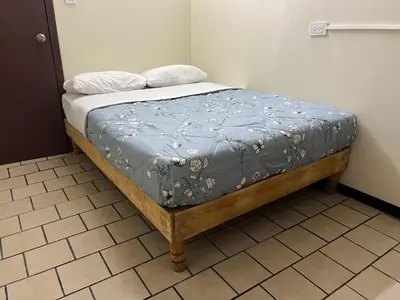 Cama o camas de una habitación en Hotel Kataluma