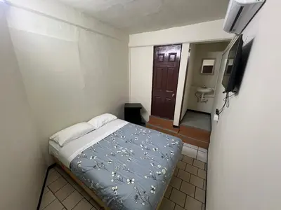 Cama o camas de una habitación en Hotel Kataluma