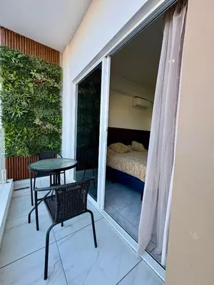 Cama o camas de una habitación en DEPA NUEVO en TORRE CORDOBA a pasos del MALECON y PLAYA