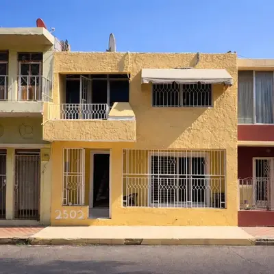 3 bedroom house one short walk from the beach