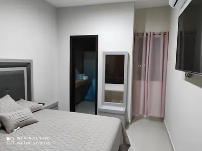 Cama o camas de una habitación en PARAISO GAVIOTAS a 4 cuadras de ZONA DORADA y MALECON