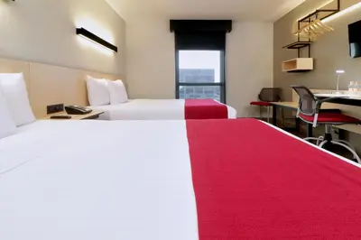 Cama o camas de una habitación en City Express by Marriott Piedras Negras
