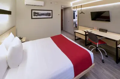 Una televisión o centro de entretenimiento en City Express by Marriott Piedras Negras