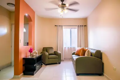 Zona de estar de Bugambilias Suites