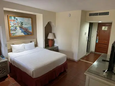 Cama o camas de una habitación en The Palms Resort of Mazatlan