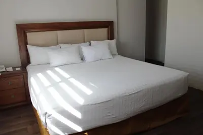Cama o camas de una habitación en Hotel Adriana