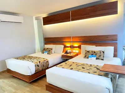 Cama o camas de una habitación en Sleep Inn Hermosillo