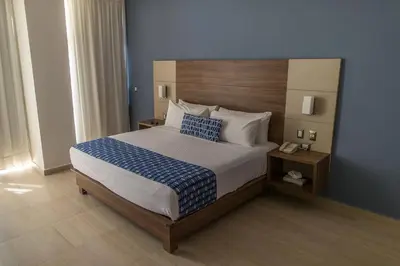 Cama o camas de una habitación en Ocean View Beach Hotel