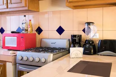 Una cocina o zona de cocina en Hotel Casa Mangos Loreto