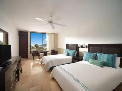 Cama o camas de una habitación en El Cid Castilla Beach