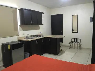 Una cocina o zona de cocina en Hgen Rooms & Suites