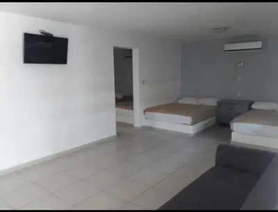 Cama o camas de una habitación en Mona Inn