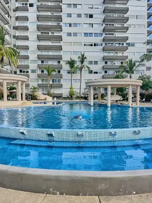 Piscina en o cerca de FRENTE AL MAR A PIE DE PLAYA ALBERCA y JACUZZI 7