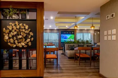 Una televisión o centro de entretenimiento en Hotel Lucerna Culiacan