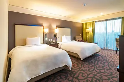 Cama o camas de una habitación en Hotel Lucerna Culiacan