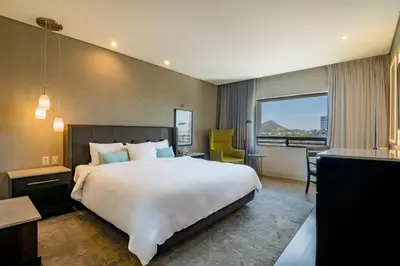 Cama o camas de una habitación en Hotel Lucerna Hermosillo