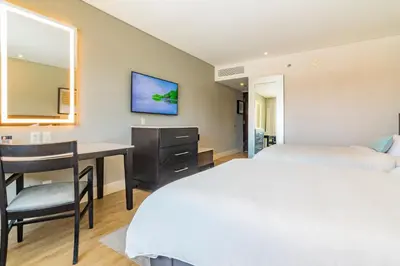 Cama o camas de una habitación en Hotel Lucerna Hermosillo